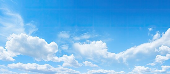 Poster - A serene natural landscape background with a white cloud in a clear blue sky, ideal for copy space image purposes.