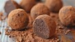 © Pixels  - Dark chocolate truffles dusted with cocoa powder, emphasizing their rich, velvety texture