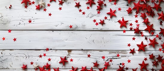 Poster - White wooden background adorned with red stars in a festive Christmas frame New year backdrop featuring a spacious copy space image