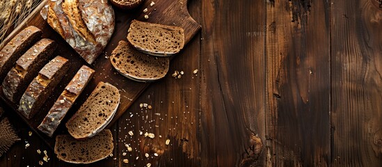 Poster - Browned bread on a rustic wooden backdrop with copy space image