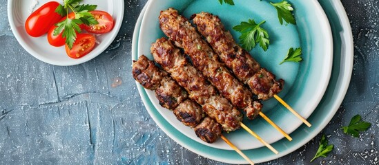 Aufkleber - Delicious Turkish kebab served on a white plate with a blue background perfect for a dinner concept with copy space image