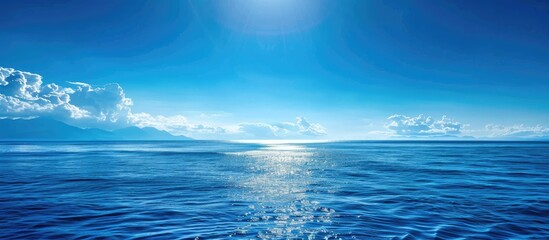 Poster - Tranquil Mediterranean seascape with a serene horizontal horizon and vast blue tones ideal for use as a copy space image