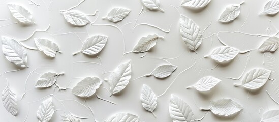 Poster - A white backdrop adorned with textured leaf patterns creating a charming copy space image