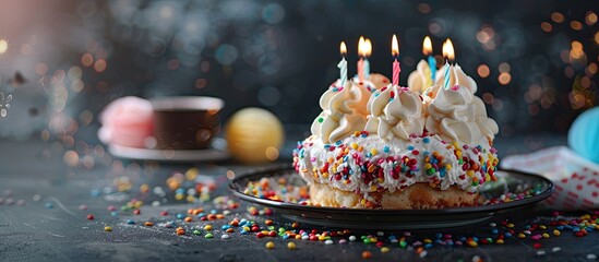 Poster - Celebratory dessert with candles ready for a birthday party with copy space image