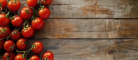 Wall Mural - Top view of tomatoes on a wooden backdrop with copy space image