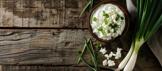 Sticker - Top view of a healthy salad featuring green spring onions and light cheese accompanied by Greek yogurt Contains copy space for images