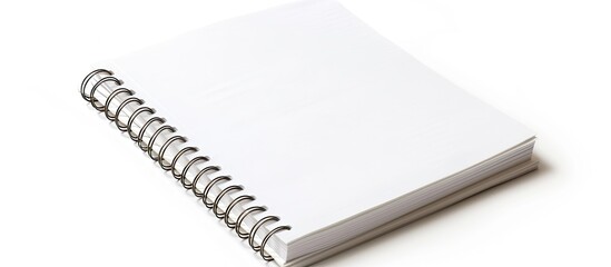 Poster - Isolated on a white background a spiral bound notepad displays a blank white page with ample copy space image