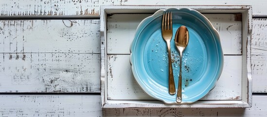 Sticker - Top view of a handcrafted blue ceramic plate with cutlery on a white wooden tray displaying a menu with copy space image