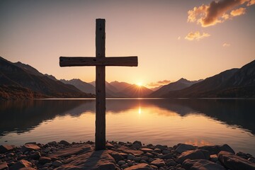 Scenic view of a cross by a lake at sunset