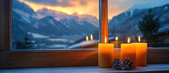 Canvas Print - Candles placed on a windowsill with a stunning mountain view in the background perfect for a cozy evening copy space image