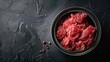 © 2rogan - Canned homemade Charolais beef meat on black surface for advertising