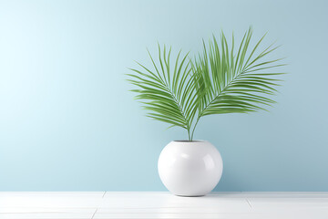 A white vase with green palm leaves against a blue wall, minimalist design, fresh and clean, perfect for summer decor. 
