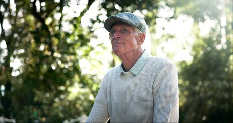 Canvas Print - Thinking, happy and senior man in garden of nursing home for retirement and wellness. Smile, elderly male person and memory for health, relax and care or comfort in nature or backyard in morning