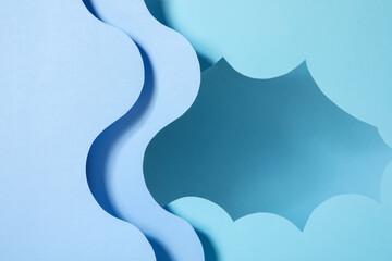 Sticker - Presentation of product. Paper cutouts on light blue background. Space for text