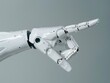 © Daria - Robotic hand pointing with copy space, white artificial humanoid hand gesture on gray background