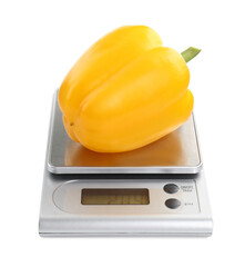 Wall Mural - Kitchen scale with bell pepper isolated on white