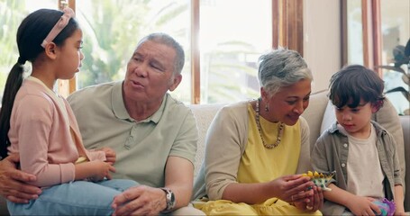 Poster - Grandparents, children and conversation in home living room, playing with toys and bonding. Senior woman, man and happy kids talking on couch, story and care, love and connection of family together