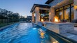 © Ramzan - Contemporary suburban home with a luxurious outdoor pool that features underwater lighting and a nearby fire pit for evening relaxation