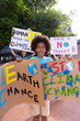 © wavebreak3 - Happy diverse schoolchildren holding ecology posters made in art class outside school