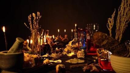 Wall Mural - Occult and esoteric witch doctor still life. Halloween background with magic objects. Black candles, skull, crystal stones, and potions vials, witch ritual. Mystic witchery background with weeds.