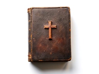 Old holy bible, cross isolated on a white background, top view.