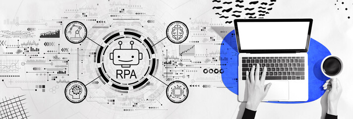 Wall Mural - Robotic Process Automation RPA theme with person using a laptop computer