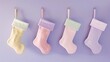 © CatNap Studio - 3D render of Christmas stockings in pastel colors hanging on a pastel purple background. very detailed