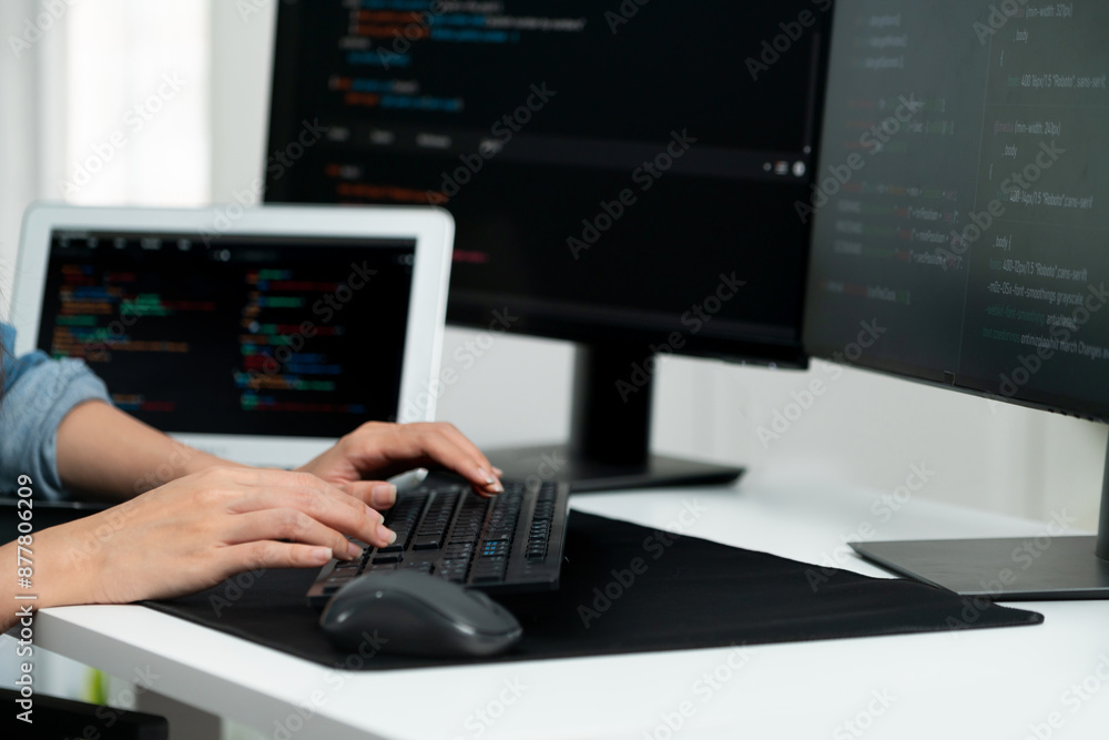 Cropped hands image of IT developer creating with typing information on ...