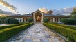 © Ramzan - ranch house with an elegant stone walkway leading to a grand front entrance, surrounded by manicured bushes