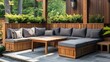 © Ramzan - wooden Craftsman-style modular outdoor seating arrangement, featuring versatile components that can be reconfigured as needed for events or relaxation