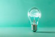 © kitipol - A light bulb emitting a brain hologram, set on a solid color background. The visual represents creativity and smart thinking, with ample copy space around it.