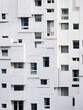 © evening_tao - Modern Geometric Facade of Urban Apartment Building