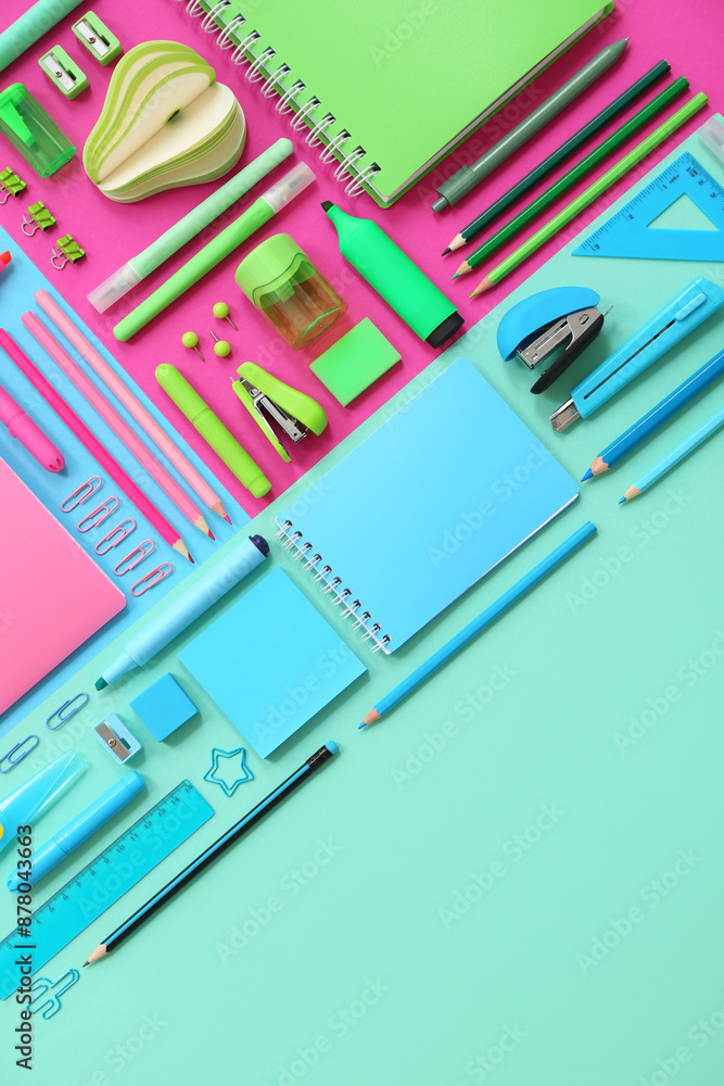 Composition with notebooks and stationery on color background