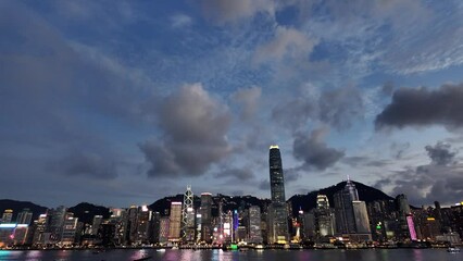 Wall Mural - Video shooting from Tsim Sha Tsui about the view of Hong Kong Victoria Harbour at magic hour.