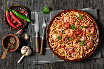 Poster - shrimp fra diavolo with spaghetti on a plate