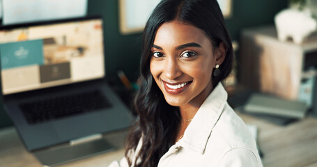 Poster - Portrait, business and Indian woman with laptop, smile and confidence in office for creative agency. Face, consultant and happy graphic designer with career ambition, website layout or online project
