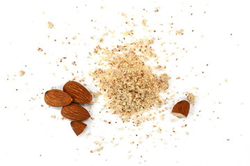 Shelled and ground Ground, milled, crushed almond nuts isolated on white. Edible, dried, brown seeds of Prunus dulcis. Ingredient in marzipan, nougat, cookies.