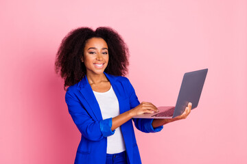 Poster - Photo of lovely cute nice girl wear trendy blue clothes hands hold modern device isolated on pink color background