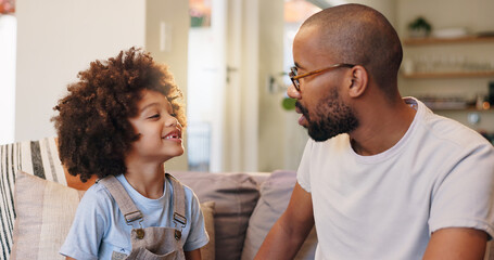 Canvas Print - Father, boy and couch in home, conversation or relax in living room for advice and bonding. Communication, support or love in lounge with dad person, chat or care from single parent for child on sofa