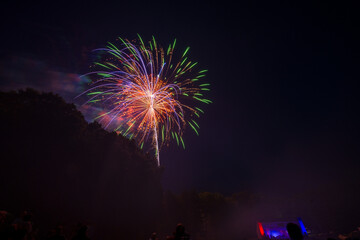 Photograph of fireworks against a dark sky