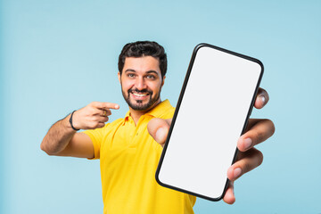 Indian asian Bearded Man Holding Smartphone Empty Screen, 3D Effect Hand Close-Up, Blue Background