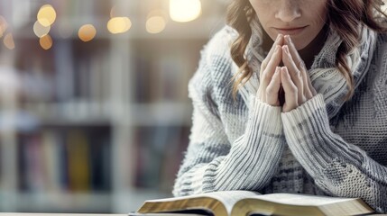 Wall Mural - Woman Praying with Hands Over Bible, Panoramic Banner with Hard Light