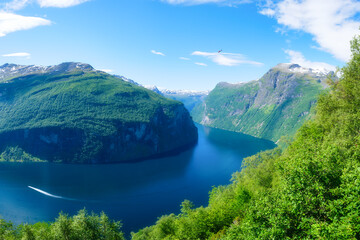 Wall Mural - geiranger fjord, norway. nature in fjords. panoramic view. traveling on a norwegian fjord. scandinav