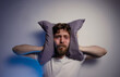 © phoenix021 - Man having insomnia, can't sleep over the noise that someone is making , putting pillow on the head
