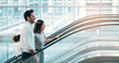 © Marco v.d Merwe/peopleimages.com - Escalator, morning and business people in office talking for arrival in lobby for work, job or career. Modern building, corporate team and workers on electrical stairs chat, workplace and coworker