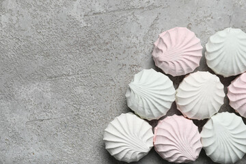 Wall Mural - Sweet zefirs on grey background, top view