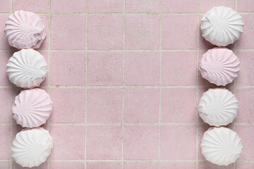 Wall Mural - Many sweet zefirs on pink background