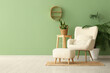 © Pixel-Shot - Armchair with pouf and plants in living room
