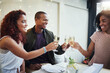 © peopleimages.com - Friends, champagne cheers and woman at party with celebration and event from engagement announcement. Alcohol, glasses and smile with congratulations, reunion and holiday drinks in home with toast