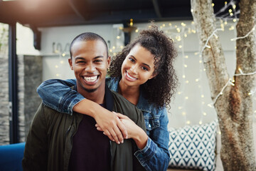 Canvas Print - Happy, couple and portrait with hug in backyard for marriage, commitment and date on anniversary. Man, woman and love with embrace on patio by fairy lights for support, summer romance and connection